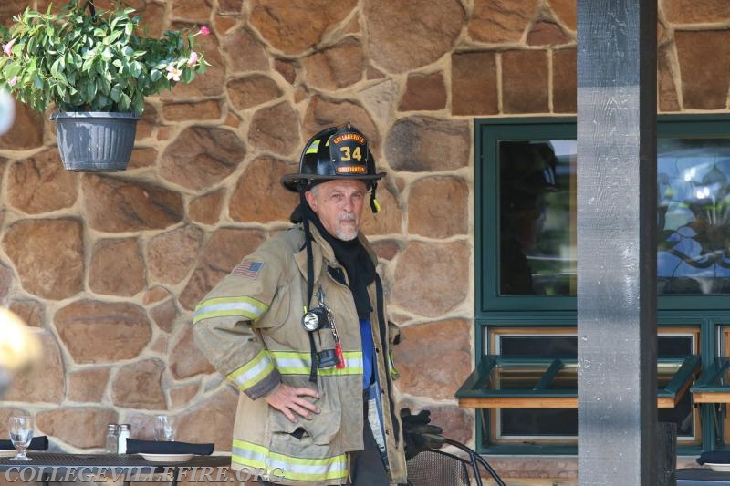 Building fire (Porch) DaVinci's Pub Collegeville Borough.  Gary Sassaman taking a break.
Photo courtesy of Dan Miller.